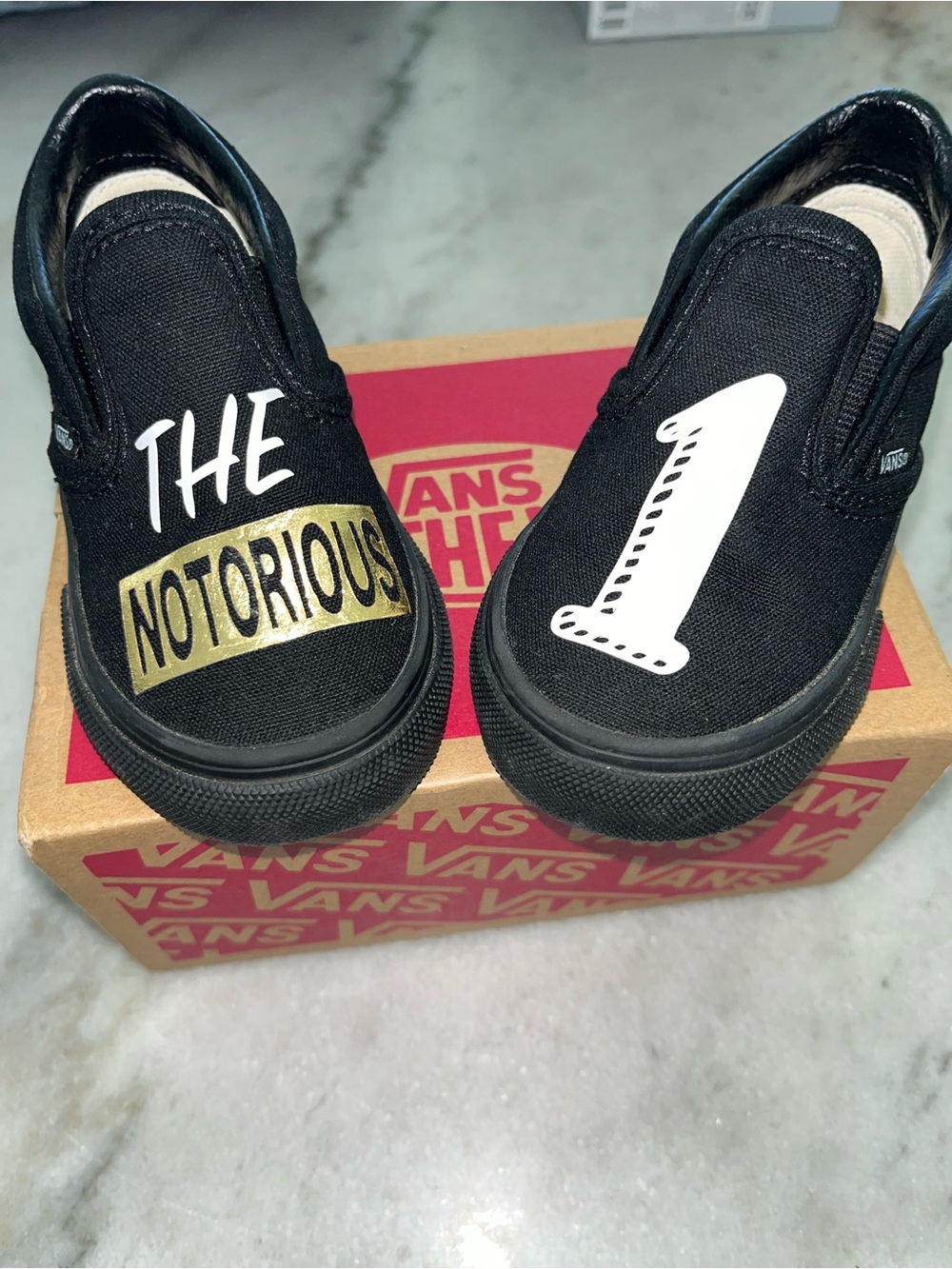 Vans Black Slip-On Kids Shoes with White & Gold Graphics